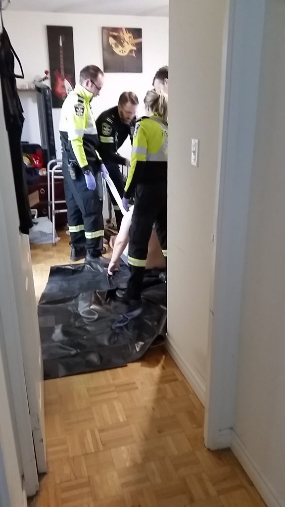 Paramedics helping Alan